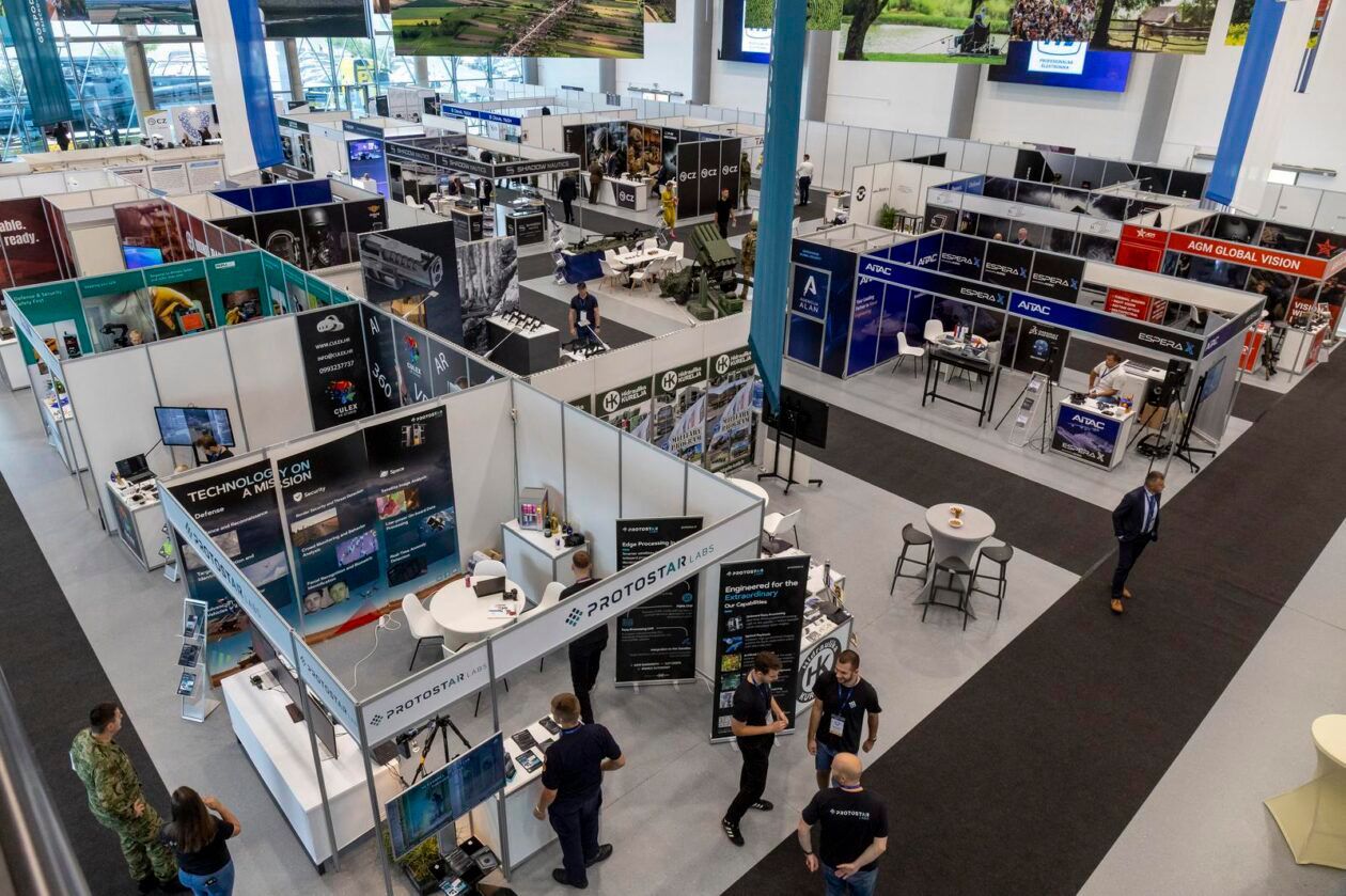 DEFCROS 2 exhibition floor — overhead view of exhibitor stands at the Osijek Exhibition Centre, Croatia (2025)