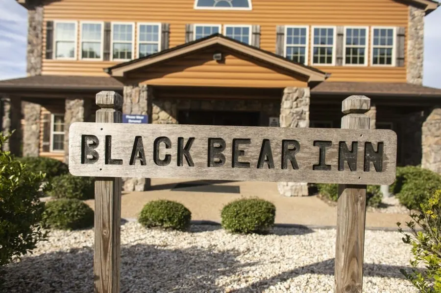 Sign in front of the Black Bear Inn, the on-site lodging