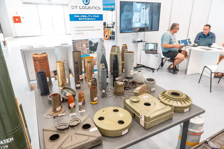 Ammunition and landmine samples on display at an exhibitor stand