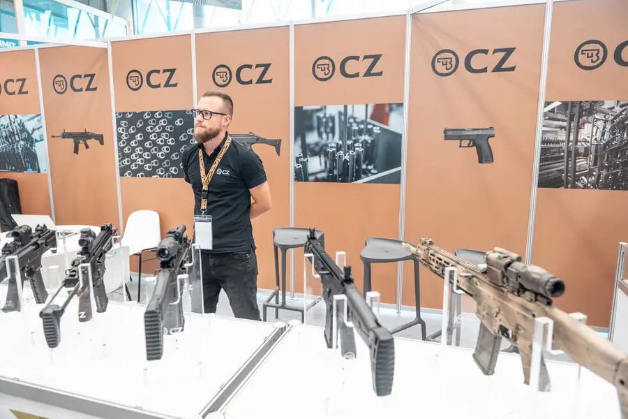 CZ exhibitor stand with rifles and pistols on display