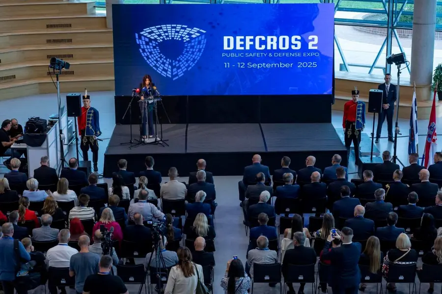 Opening ceremony — full hall with the Croatian honour guard flanking the stage