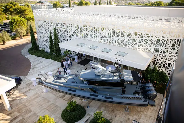 Aerial view of the Convention Centre Šibenik with a patrol boat at the entrance