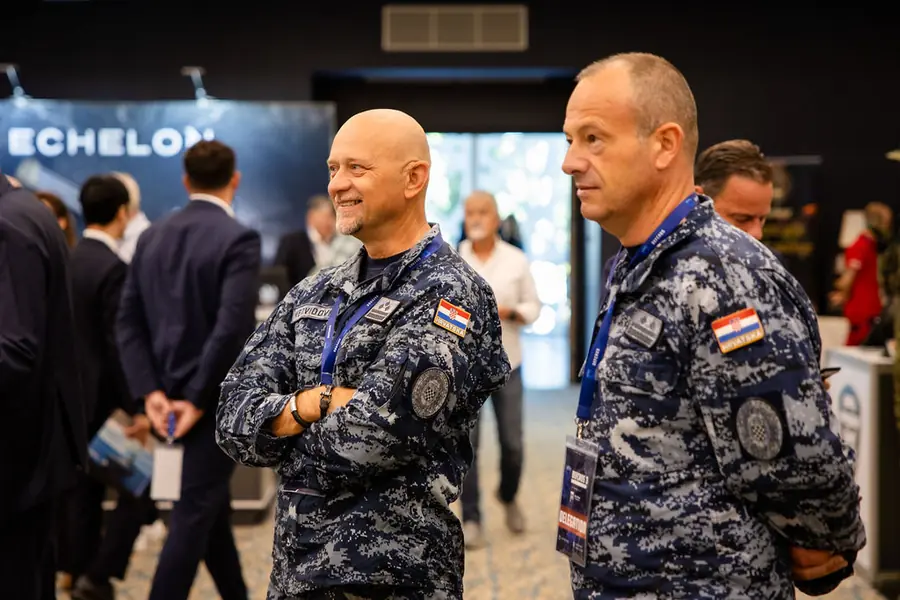 Croatian Navy officers on the DEFCROS 3 exhibition floor